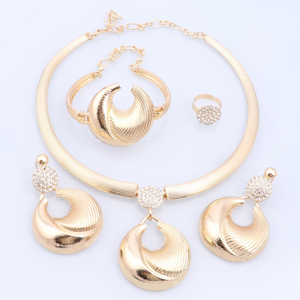 Silver plated Dubai jewelry set featuring a necklace, earrings, bracelet, and ring with intricate designs.