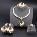 Silver plated Dubai jewelry set featuring a necklace, earrings, bracelet, and ring with intricate designs.