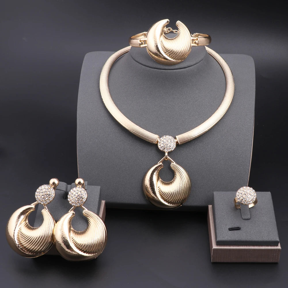 Silver plated Dubai jewelry set featuring a necklace, earrings, bracelet, and ring with intricate designs.